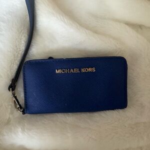 Michael Kors Jet Set Travel Saffiano leather wristlet wallet in sapphire blue